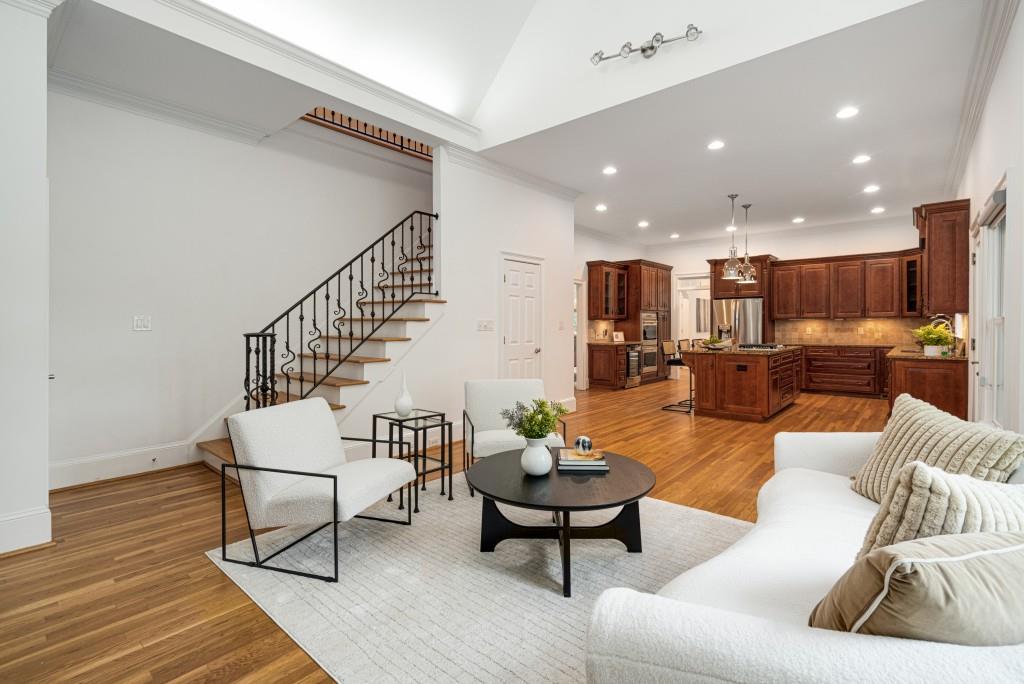 8345 Jett Ferry Road Sandy Springs, GA 30350 - Photo 26 of 61 a living room with furniture and kitchen view