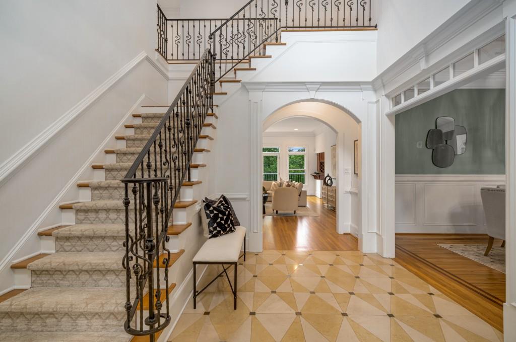 8345 Jett Ferry Road Sandy Springs, GA 30350 - Photo 3 of 61 a view of entryway and hall with wooden floor