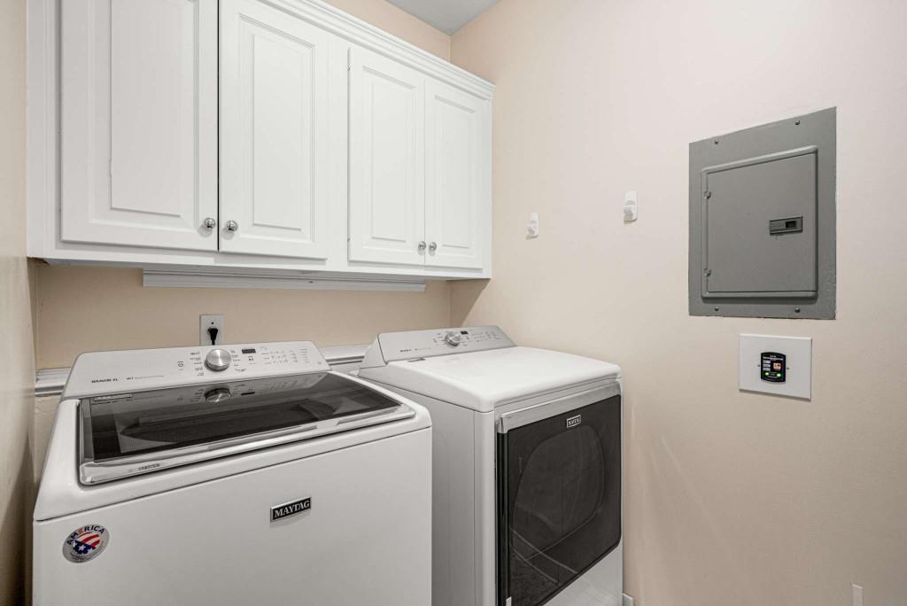 8345 Jett Ferry Road Sandy Springs, GA 30350 - Photo 43 of 61 a utility room with dryer and washer