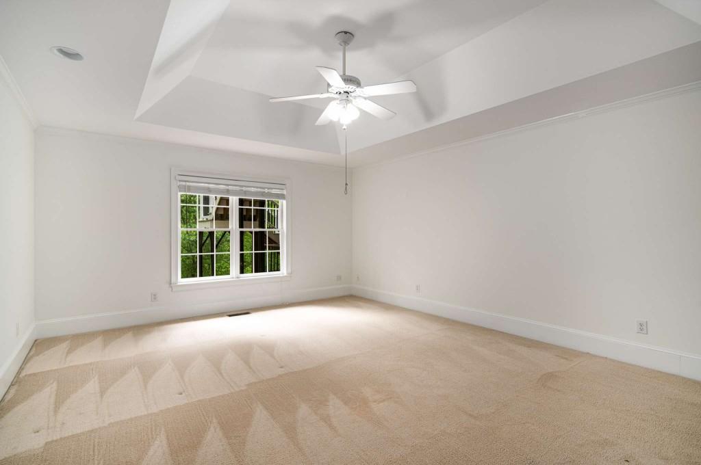8345 Jett Ferry Road Sandy Springs, GA 30350 - Photo 50 of 61 a view of an empty room with a window