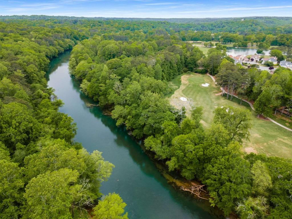 8345 Jett Ferry Road Sandy Springs, GA 30350 - Photo 61 of 61 a view of a lake with green field