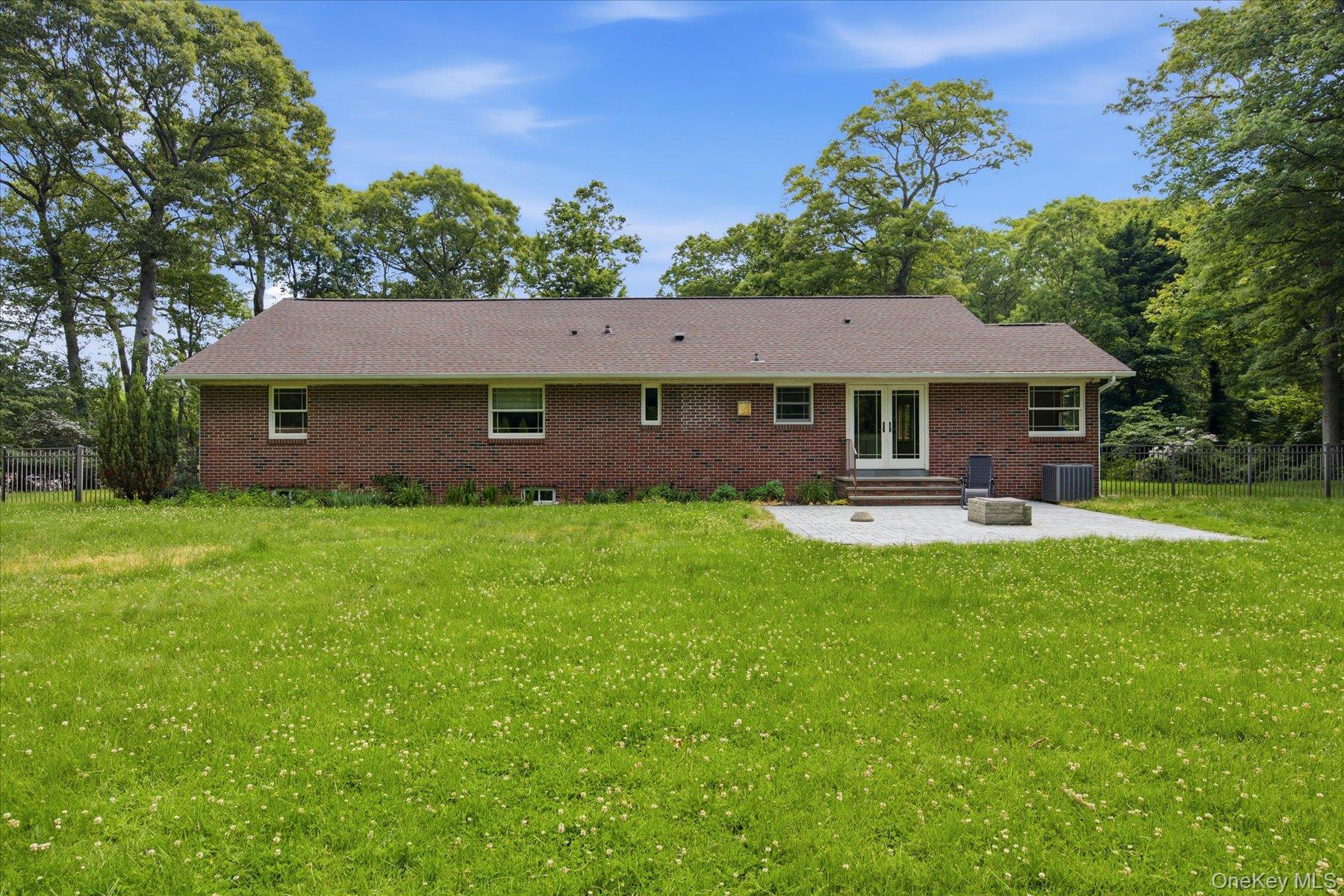 42 Cliff Road Port Jefferson, NY 11777 - Photo 21 of 22 a front view of a house with garden