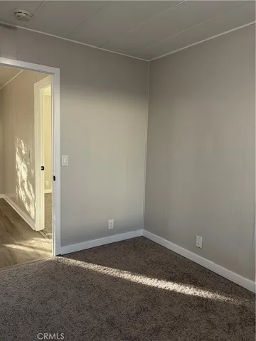 en empty room with windows