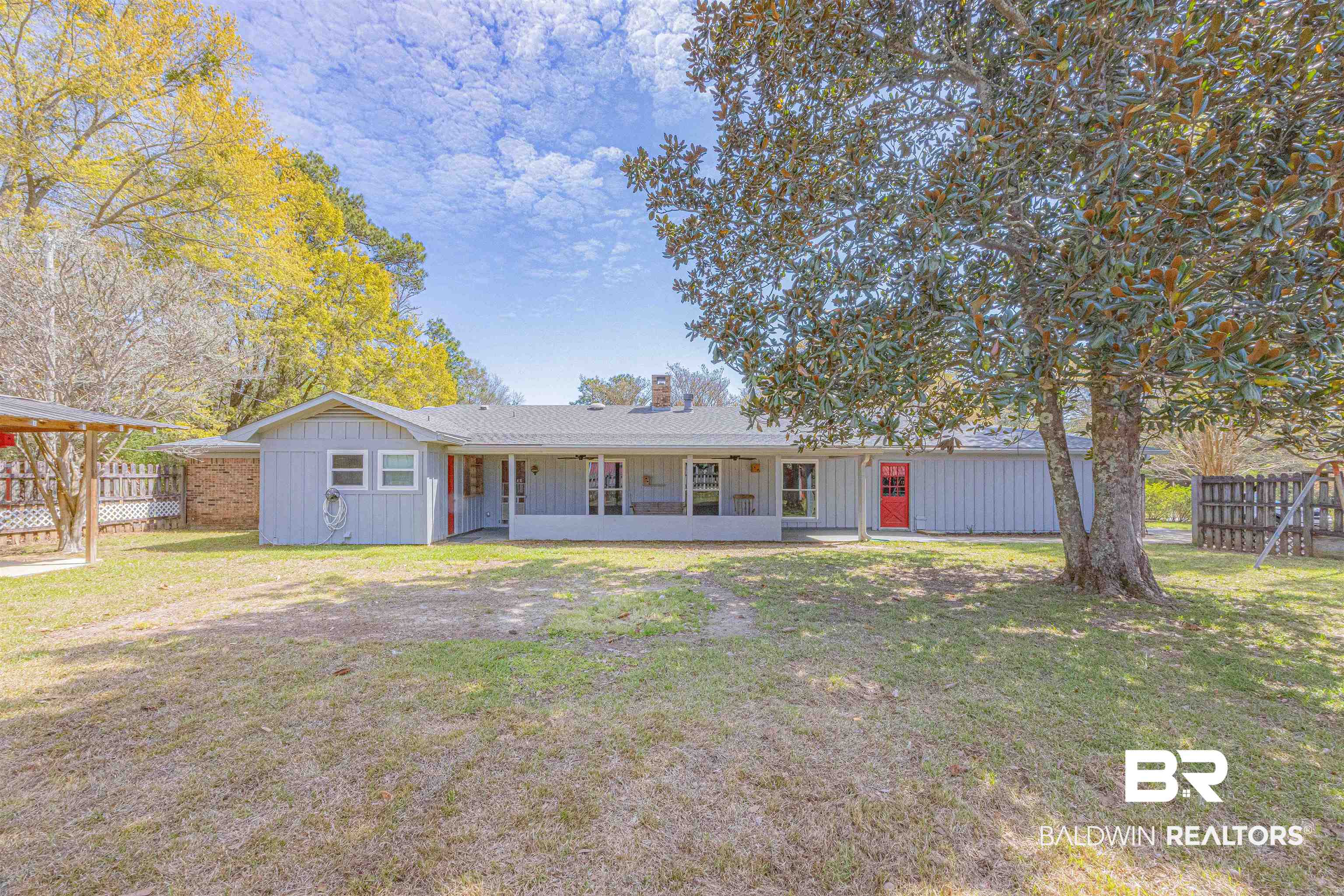 43101 Brown Road Bay Minette, AL 36507 - Photo 48 of 81 Ranch-style home with board and batten siding, a chimney, and a porch