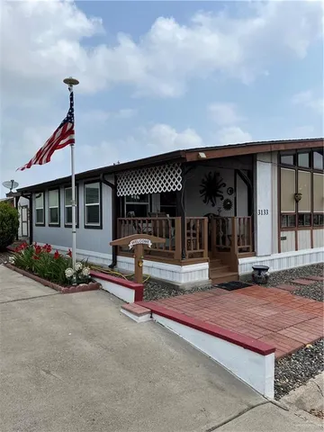 a view of a house with sitting area