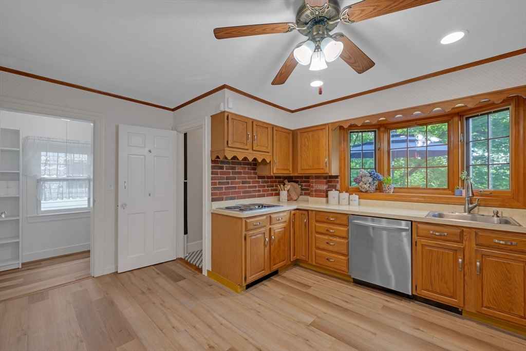 71 Morningside Road Worcester, MA 01602 - Photo 7 of 42 a kitchen with stainless steel appliances granite countertop a stove and a sink