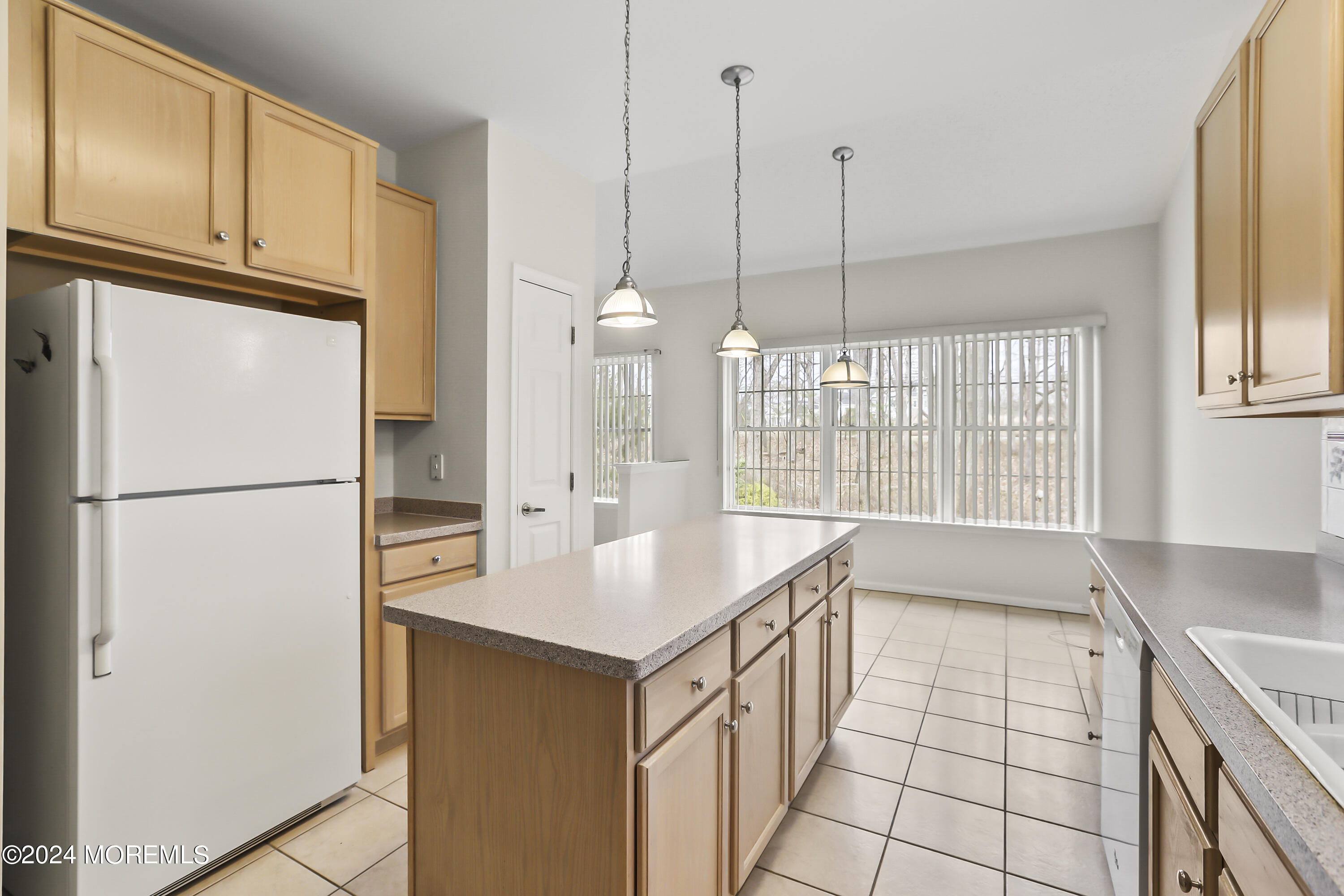 11 Rye Court Jackson, NJ 08527 - Photo 12 of 23 a kitchen with stainless steel appliances granite countertop a refrigerator a sink and a stove