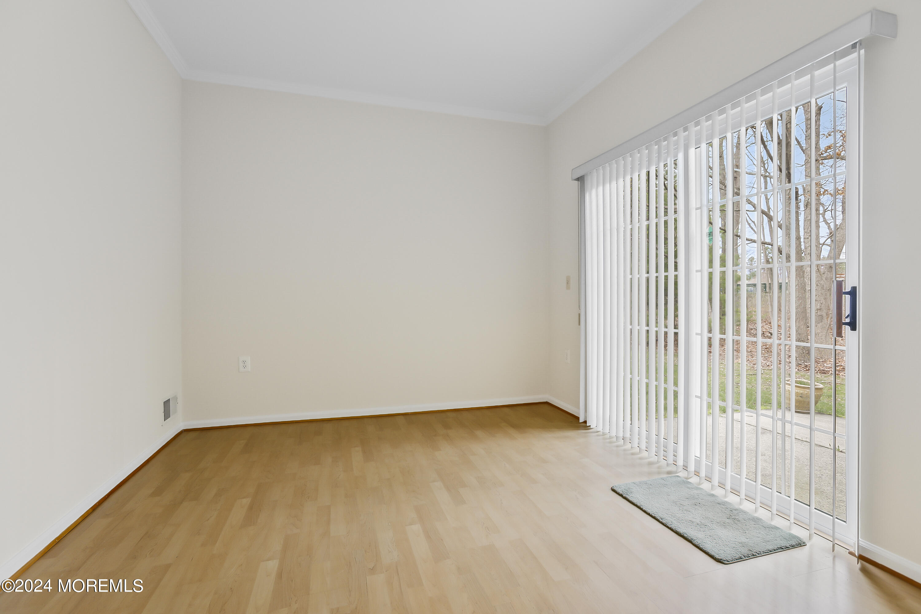 11 Rye Court Jackson, NJ 08527 - Photo 15 of 23 a view of a room with wooden floor and a window