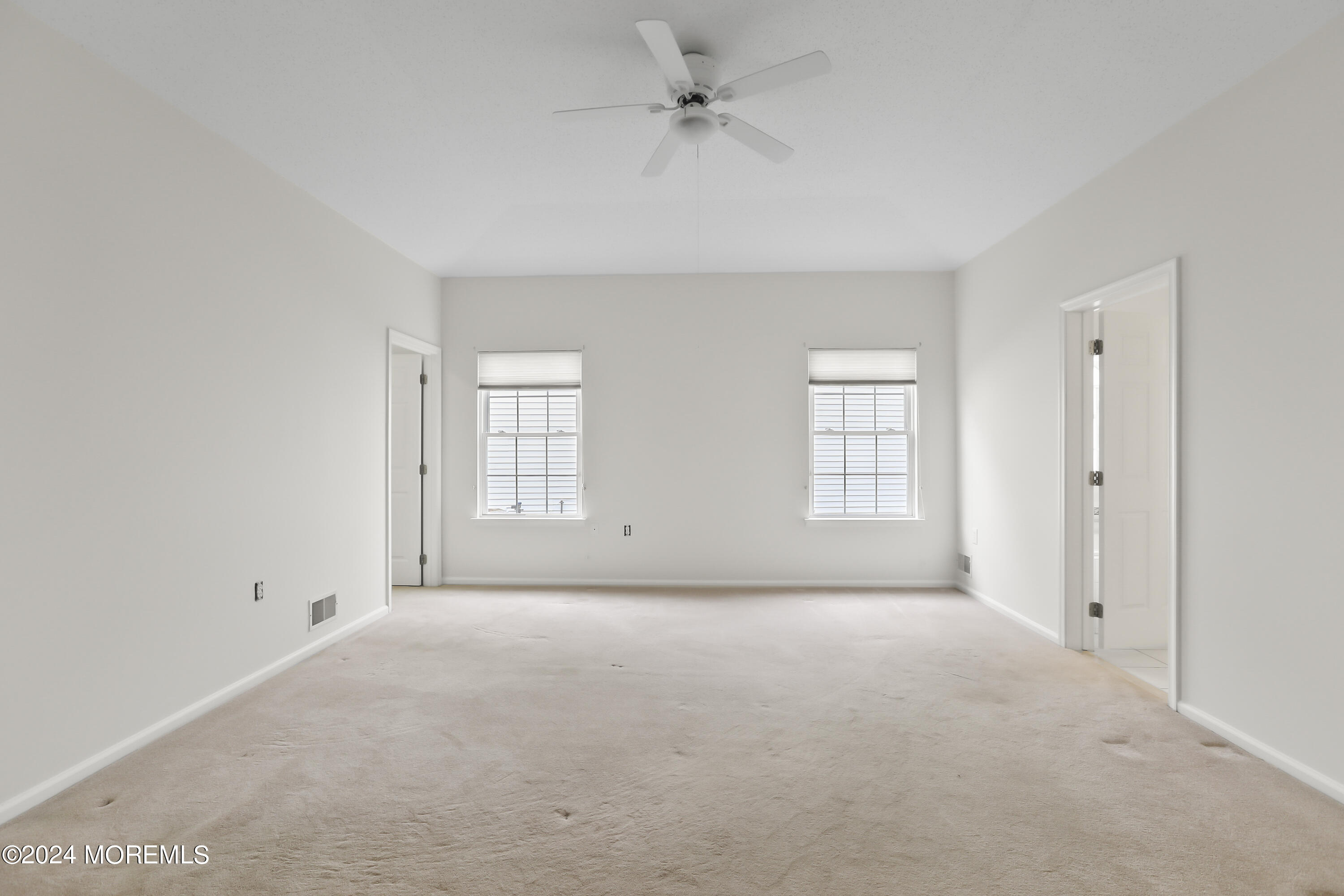 11 Rye Court Jackson, NJ 08527 - Photo 18 of 23 a view of an empty room with a window