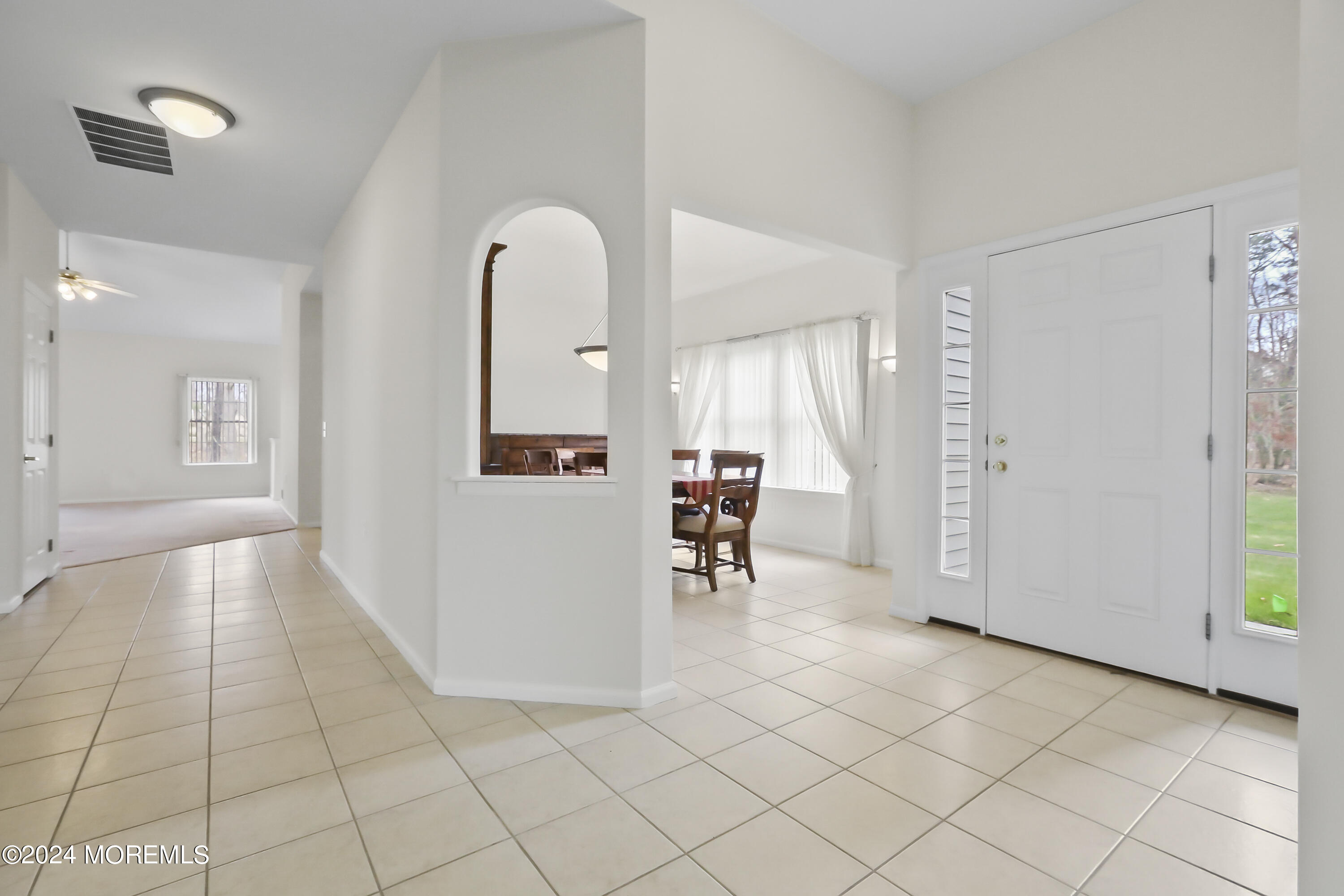 11 Rye Court Jackson, NJ 08527 - Photo 2 of 23 a view of a livingroom with furniture and an entryway
