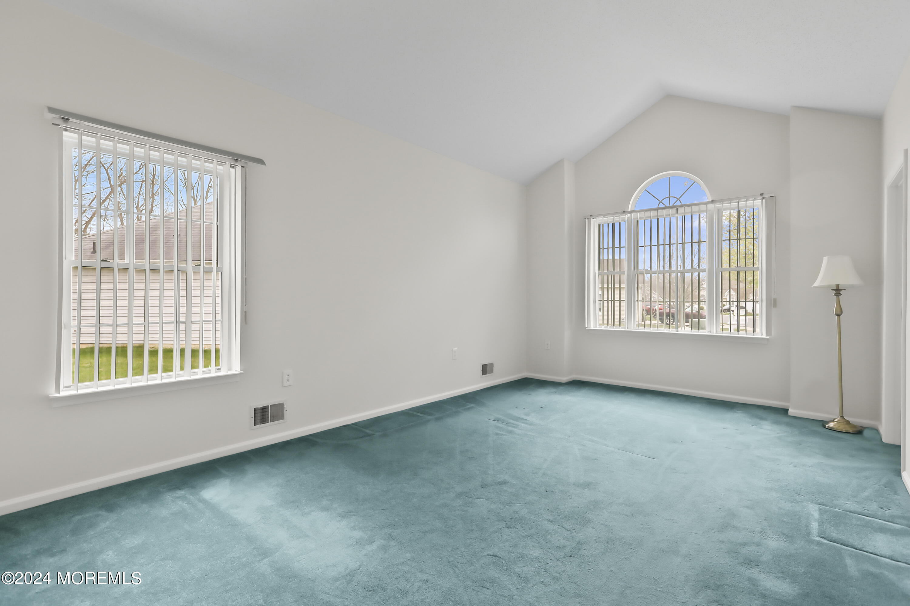 11 Rye Court Jackson, NJ 08527 - Photo 4 of 23 an empty room with windows