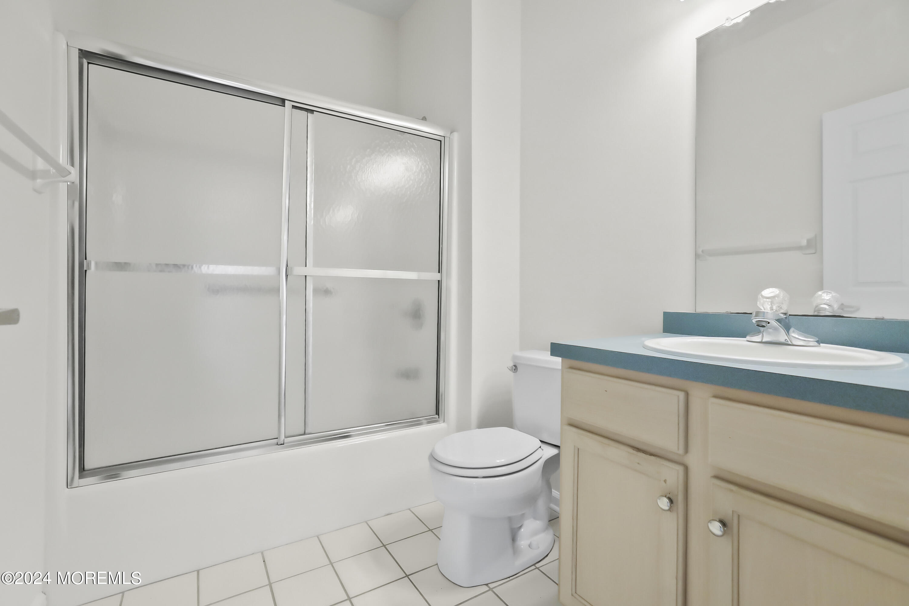 11 Rye Court Jackson, NJ 08527 - Photo 6 of 23 a bathroom with a toilet a sink and shower