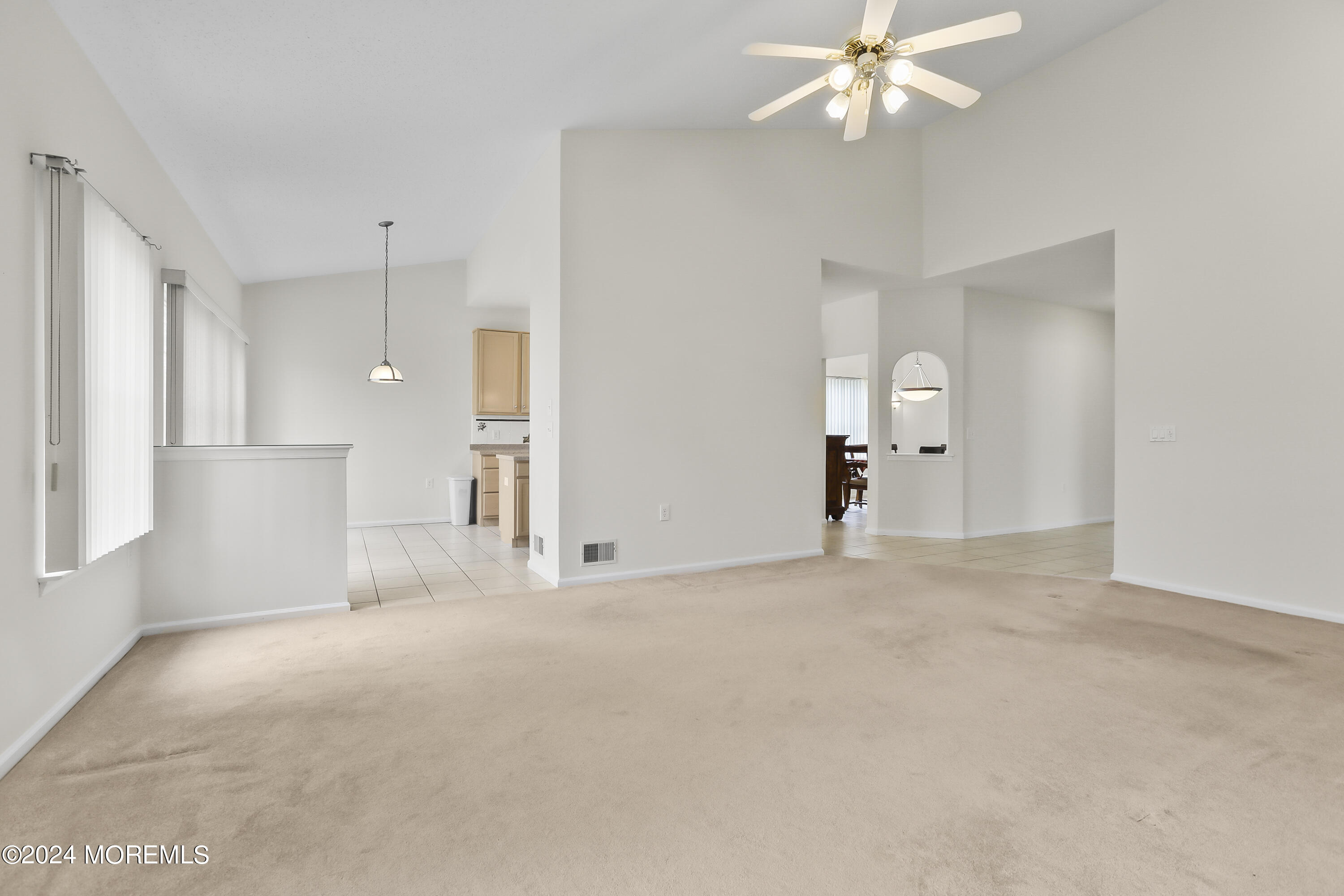 11 Rye Court Jackson, NJ 08527 - Photo 10 of 23 an empty room with fan and entrance