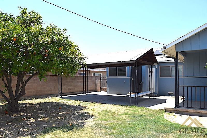 Undisclosed Address Bakersfield, CA 93305 - Photo 19 of 20 front view of a house with a yard