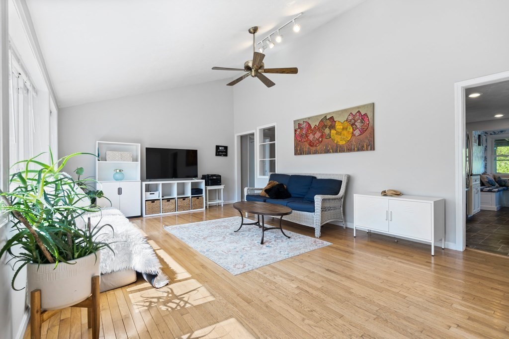 3 Bates Grove Road Webster, MA 01570 - Photo 17 of 40 a living room with furniture and a flat screen tv
