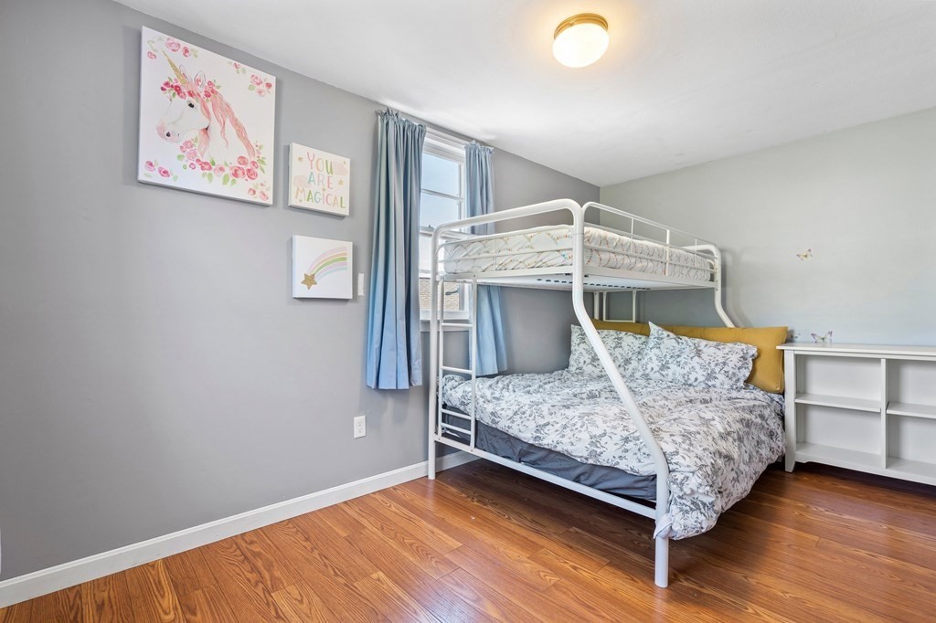 3 Bates Grove Road Webster, MA 01570 - Photo 33 of 40 a bedroom with a bed and a workspace