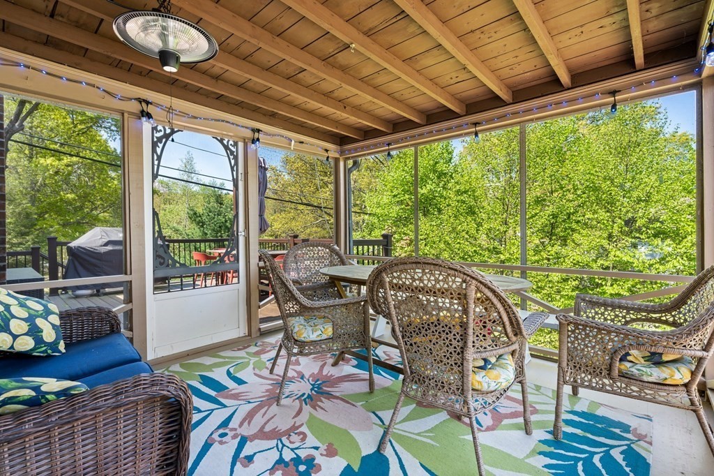 3 Bates Grove Road Webster, MA 01570 - Photo 4 of 40 a view of a dining room with furniture wooden floor and a rug