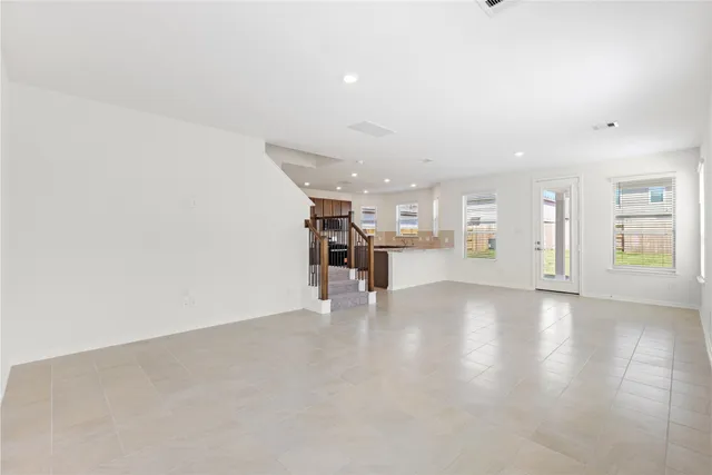 a view of a kitchen with a sink and cabinets