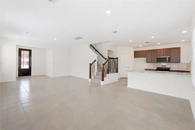 a view of a house with backyard