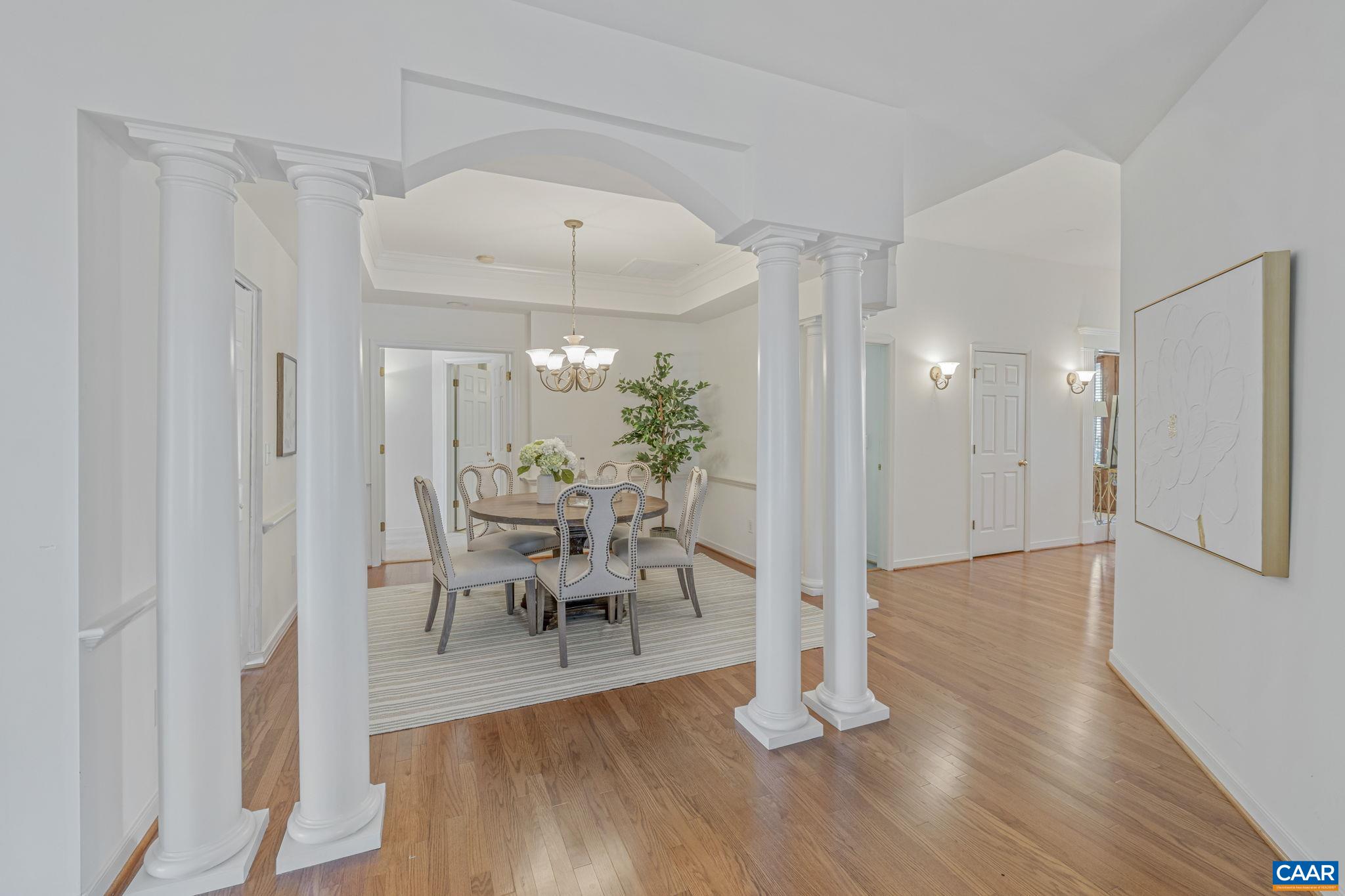 1347 Singleton Lane Charlottesville, VA 22903 - Photo 11 of 34 a view of a dining room with furniture and wooden floor