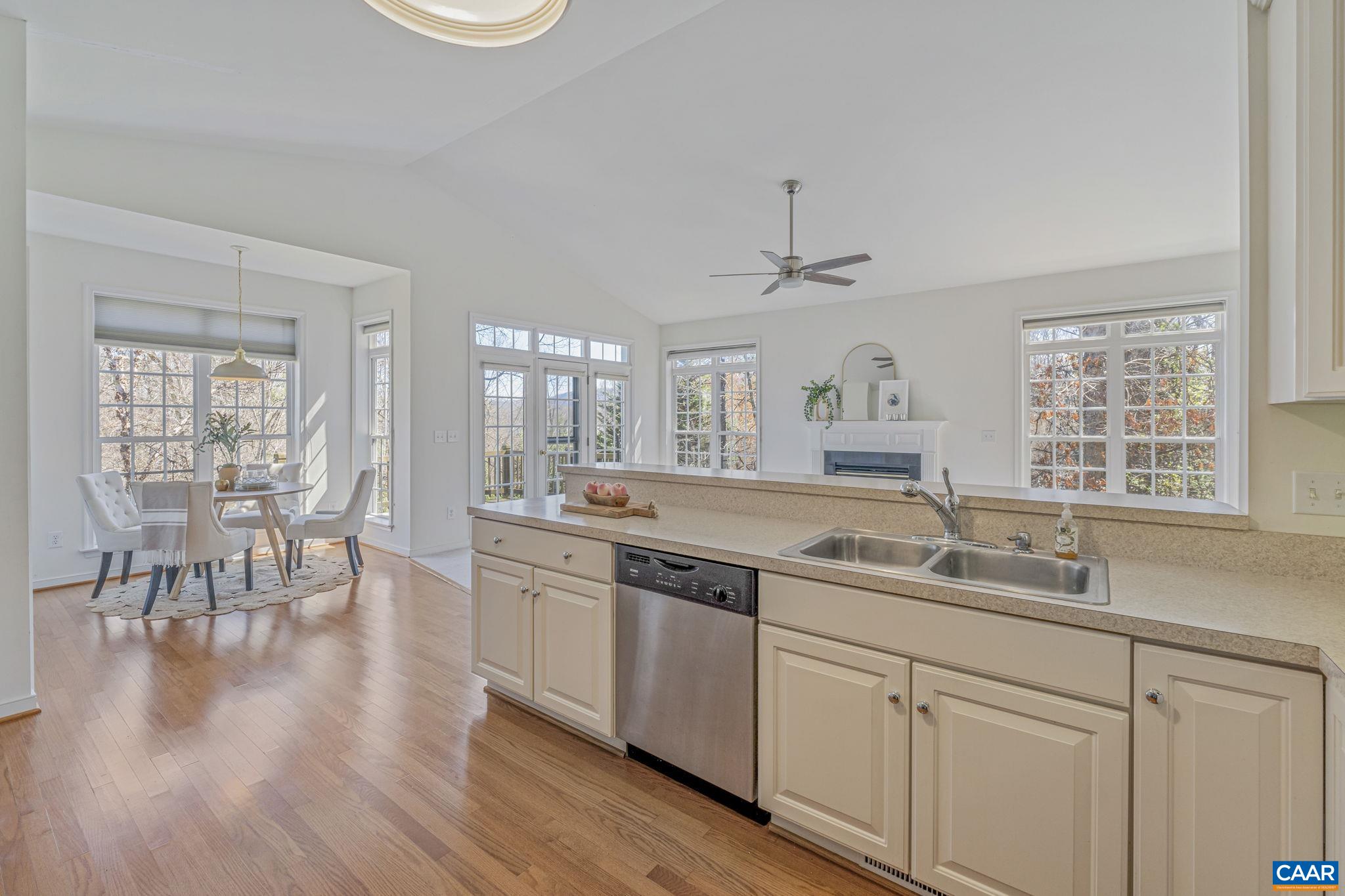 1347 Singleton Lane Charlottesville, VA 22903 - Photo 14 of 34 a kitchen with a sink cabinets and wooden floor