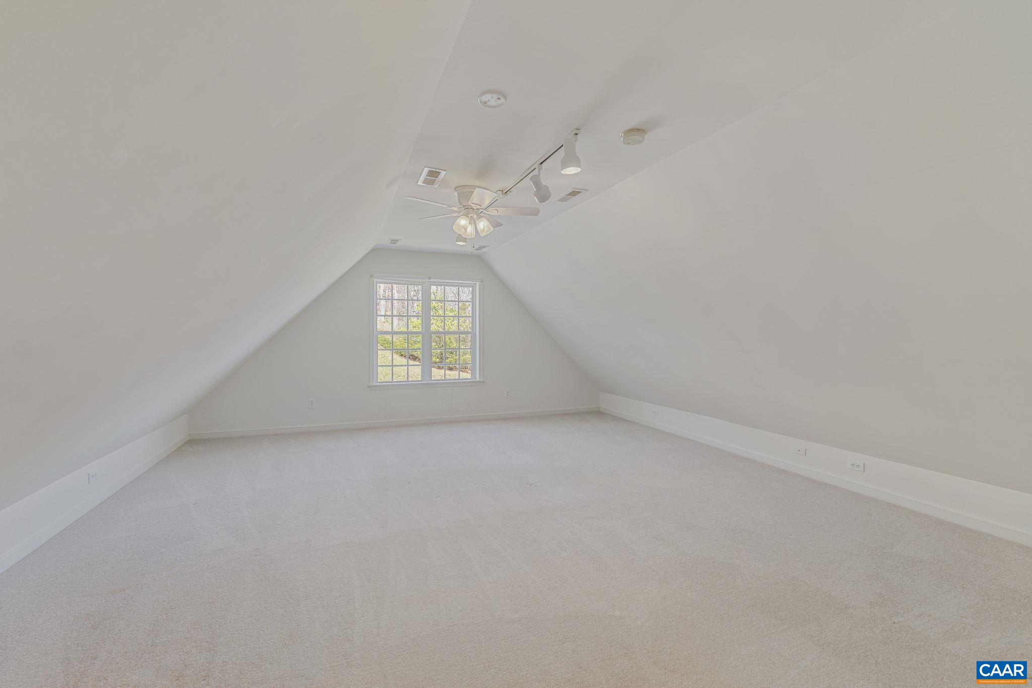 1347 Singleton Lane Charlottesville, VA 22903 - Photo 29 of 34 an empty room with windows and chandelier fan