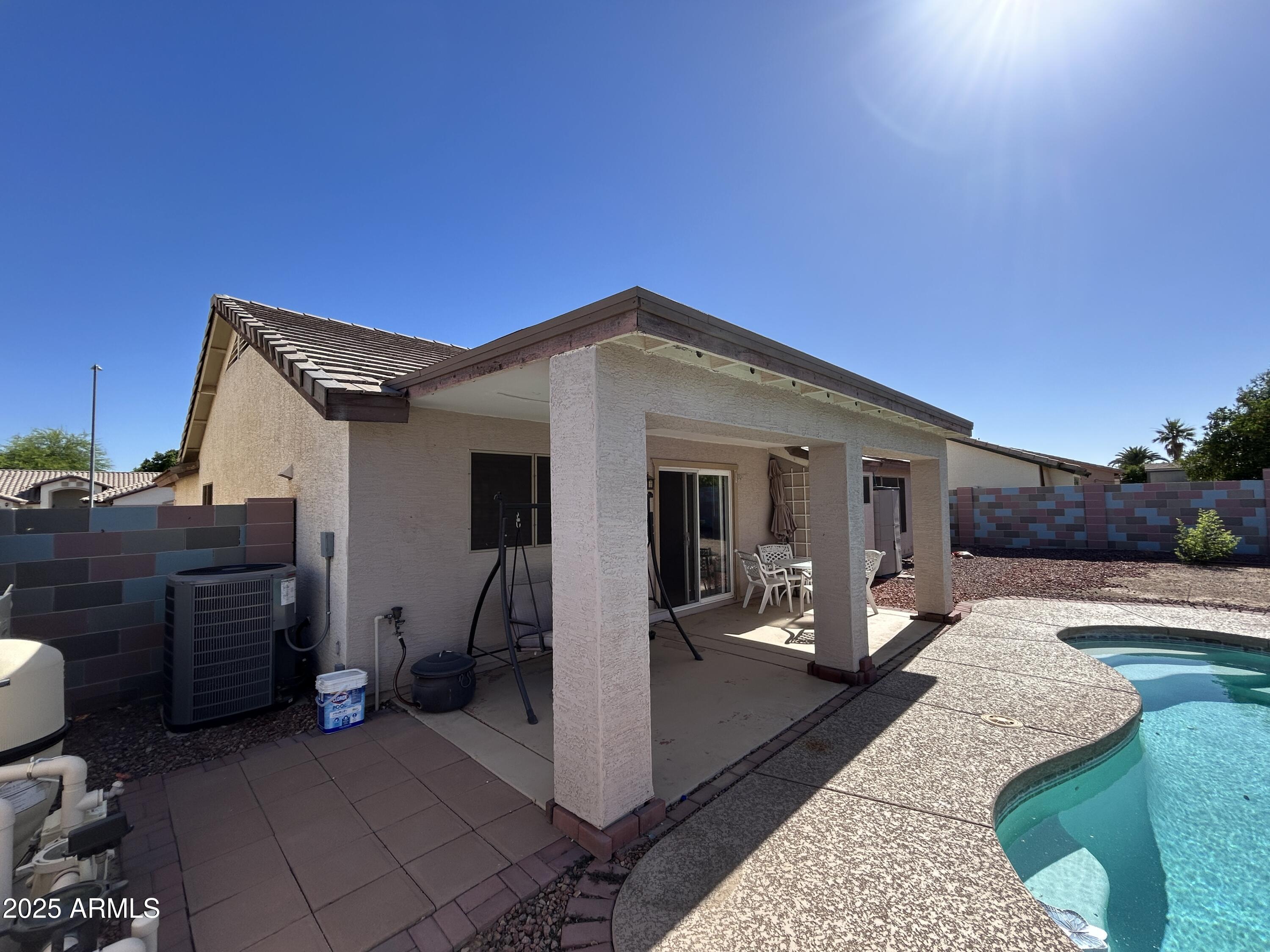 13444 West Paradise Lane Surprise, AZ 85374 - Photo 24 of 25 a view of a house with patio