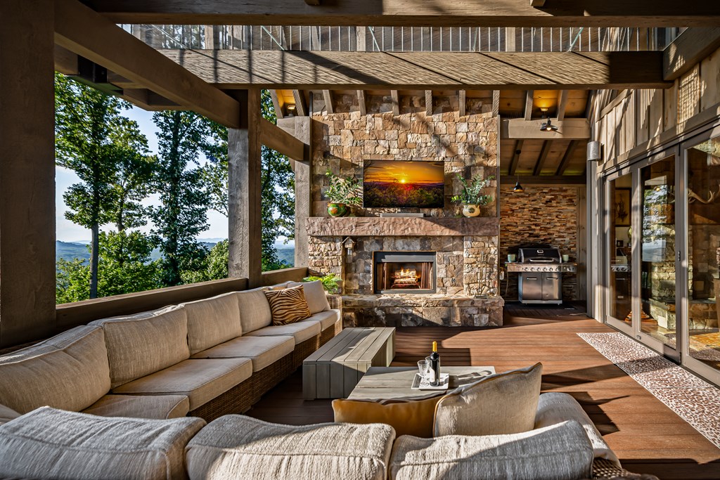 520 Overlook Drive Blue Ridge, GA 30513 - Photo 12 of 84 a outdoor living space with patio furniture and a fireplace