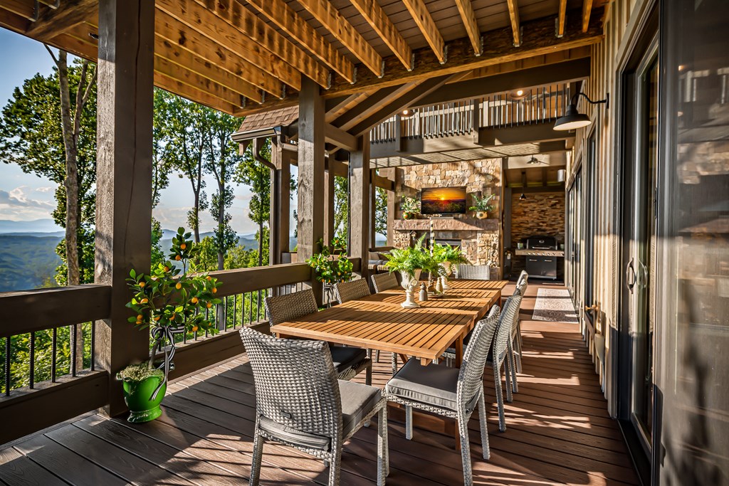 520 Overlook Drive Blue Ridge, GA 30513 - Photo 15 of 84 a view of a patio with a table and chairs