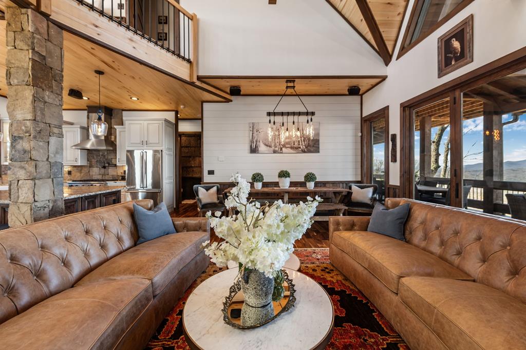 520 Overlook Drive Blue Ridge, GA 30513 - Photo 24 of 84 a living room with furniture and a large window