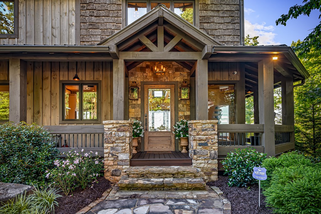 520 Overlook Drive Blue Ridge, GA 30513 - Photo 5 of 84 a front view of a house with potted plants
