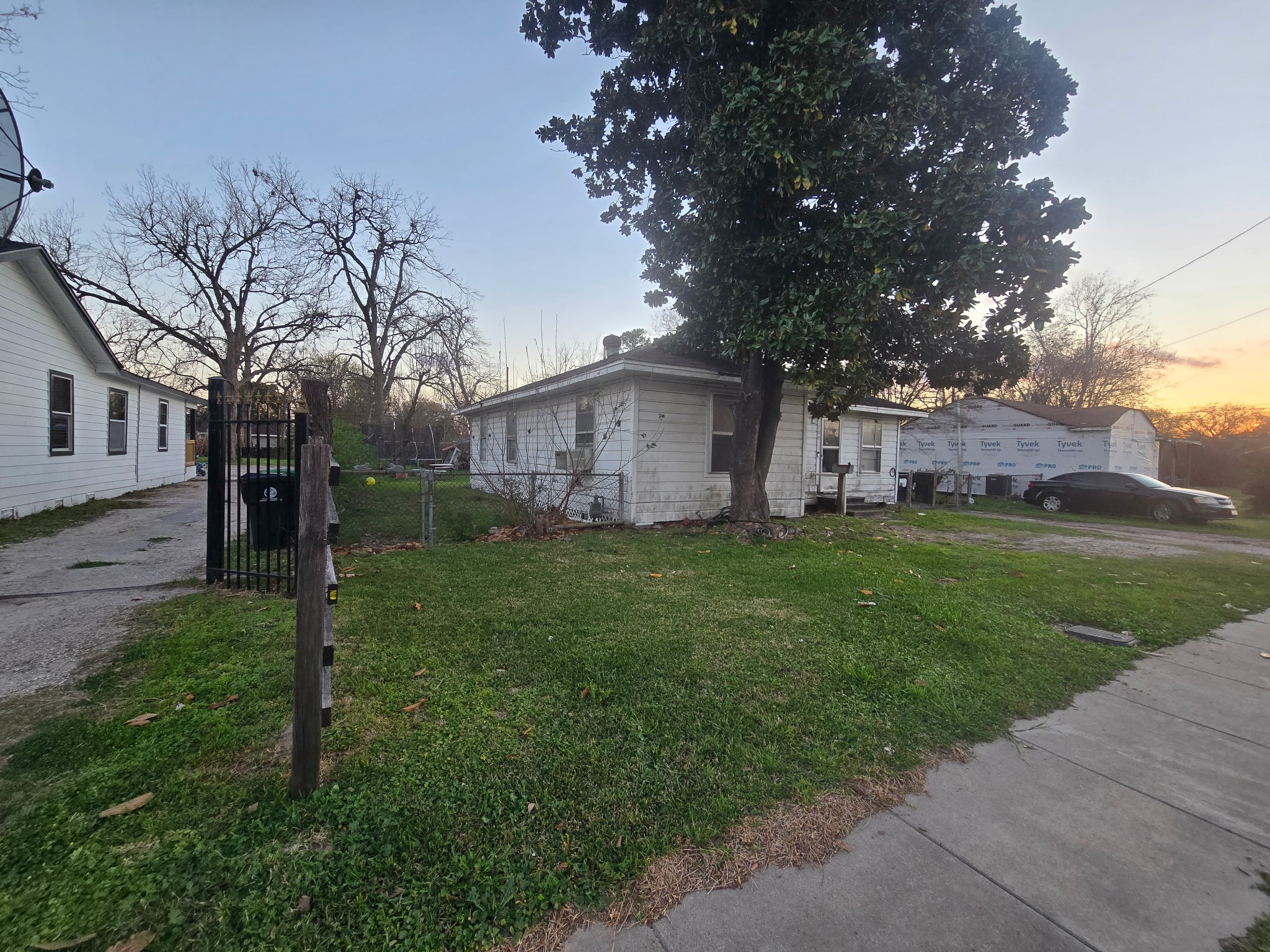 108 Parker Road Houston, TX 77076 - Photo 3 of 9 a view of a house with a yard