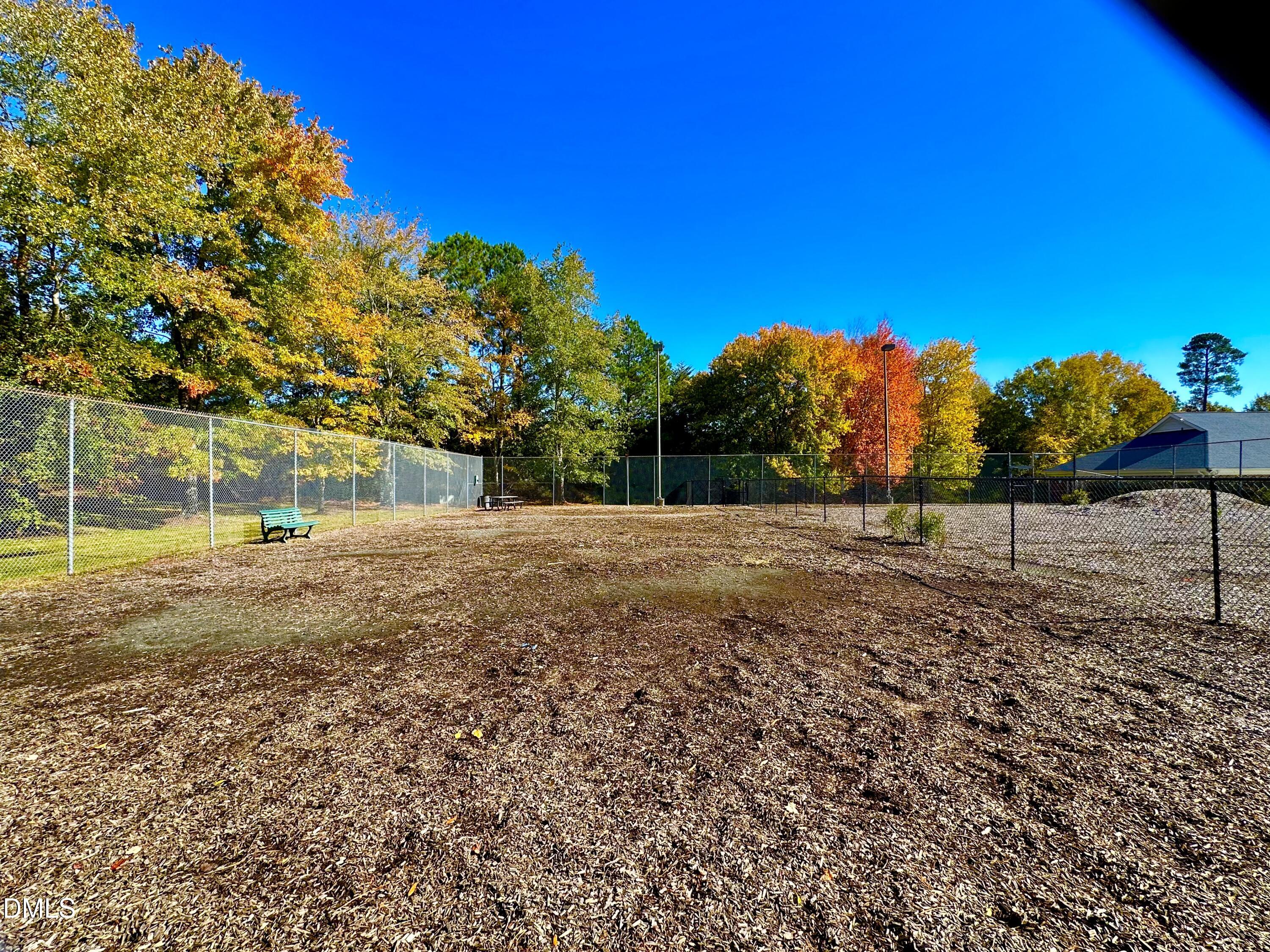 3307 Tarleton West Durham, NC 27713 - Photo 34 of 39 There is a large dog park on the grounds that used to be two tennis courts. This is next to the pool.