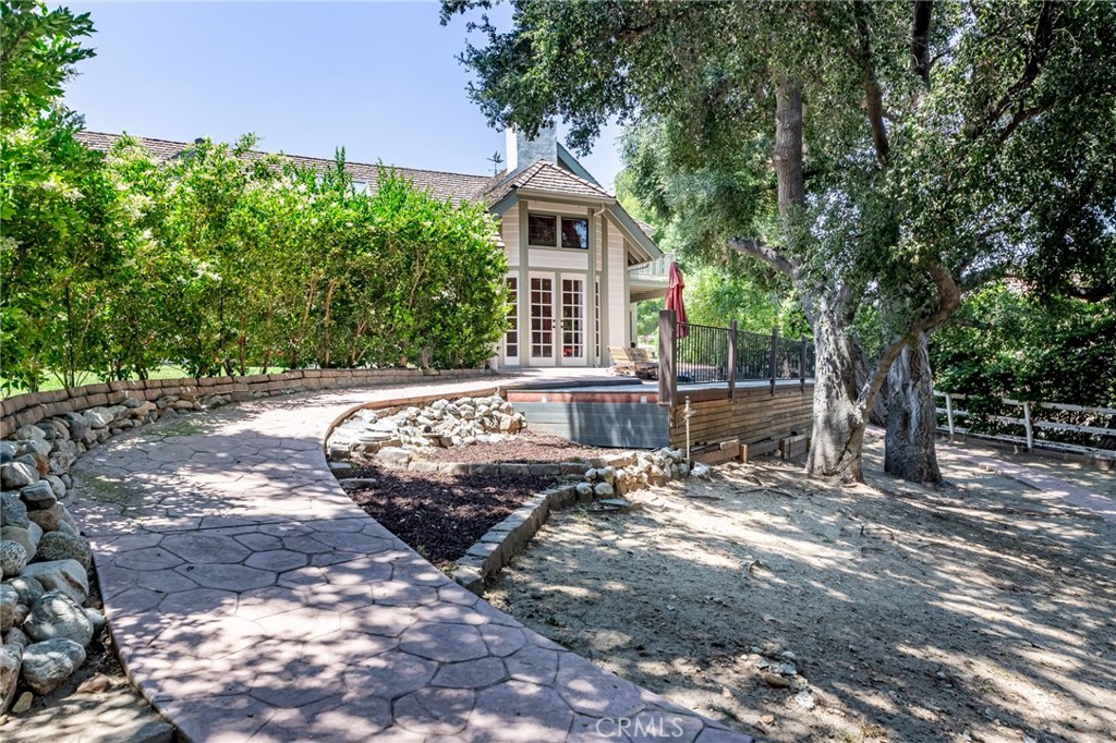 15601 Saddleback Road Canyon Country, CA 91387 - Photo 42 of 55 a front view of a house with a yard