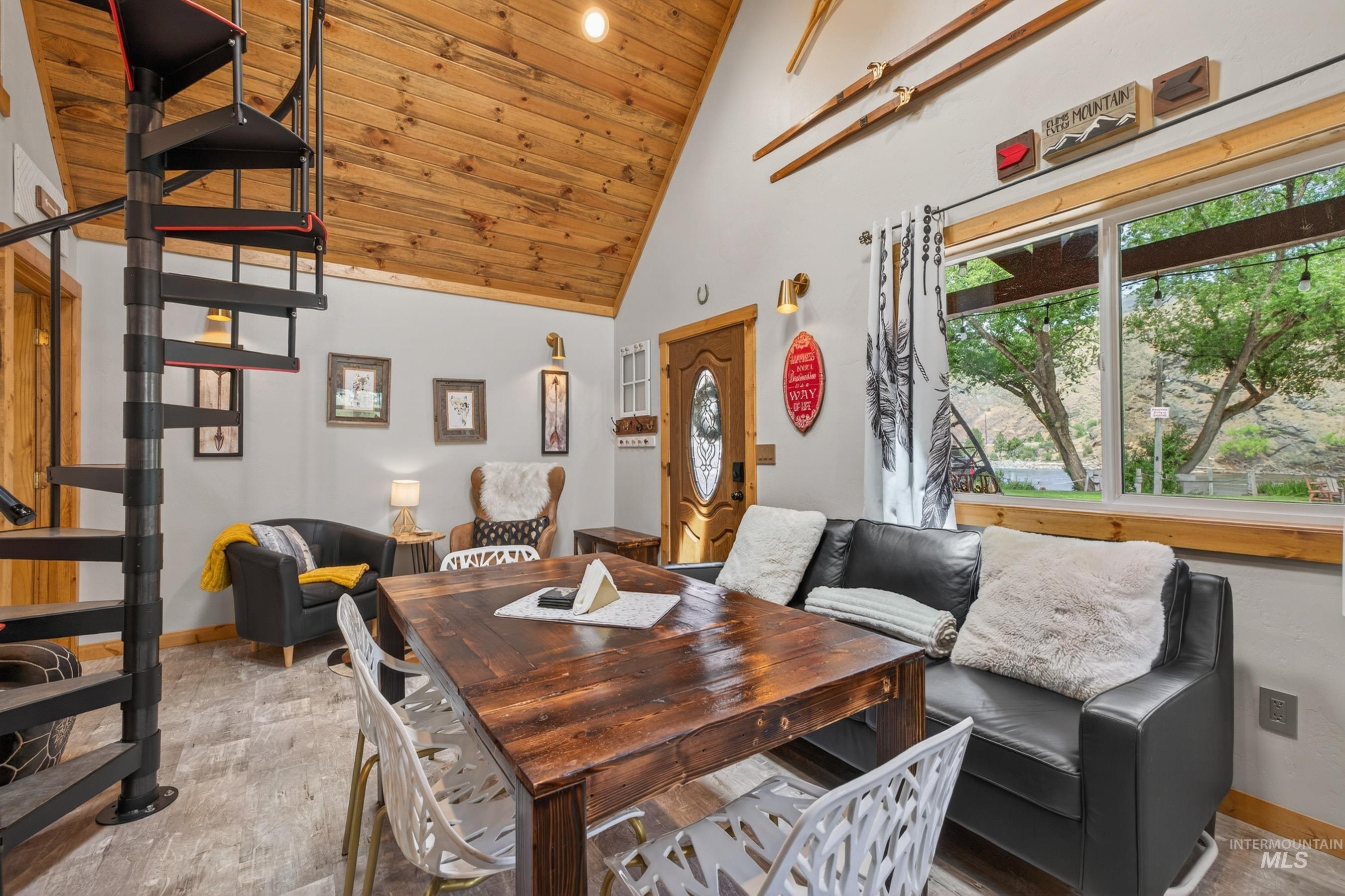 1432 Salmon Drive Riggins, ID 83549 - Photo 9 of 39 Vaulted wood-paneled ceiling with exposed beams