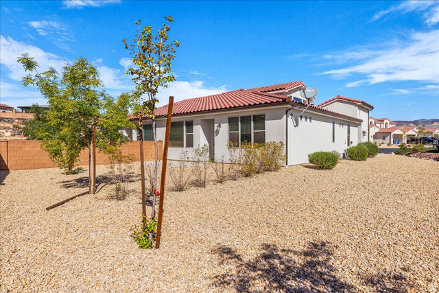 794 North Via Modelo Circle Washington, UT 84780 - Photo 6 of 21 Back of property featuring stucco siding and a tile roof