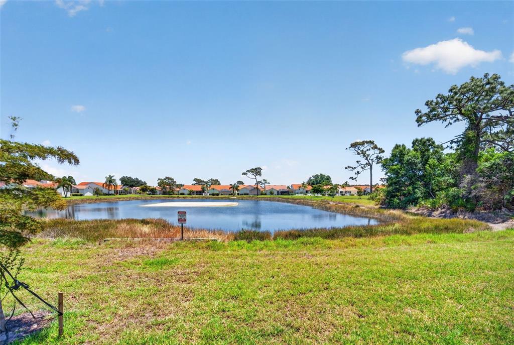 4266 Summertree Road Venice, FL 34293 - Photo 39 of 64 a view of a lake view