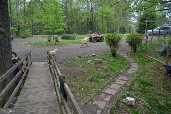 a view of dinning table and chairs in patio