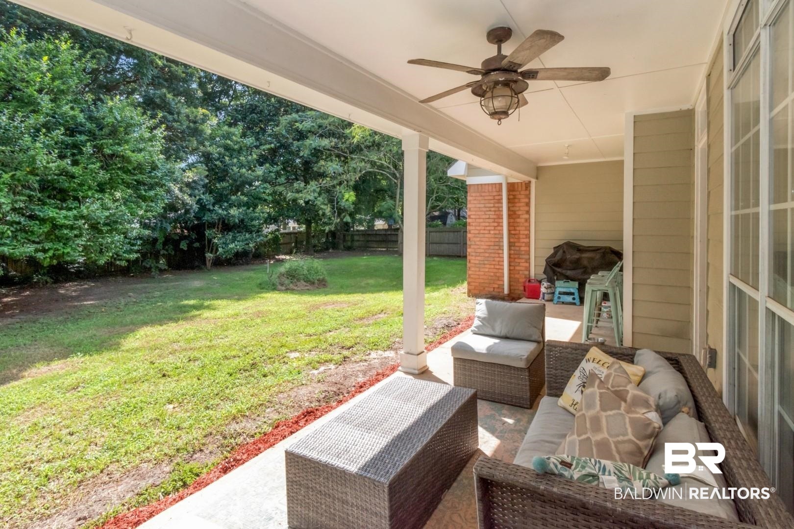 9991 Wedgefield Court Mobile, AL 36608 - Photo 25 of 30 View of patio with outdoor lounge area and ceiling fan