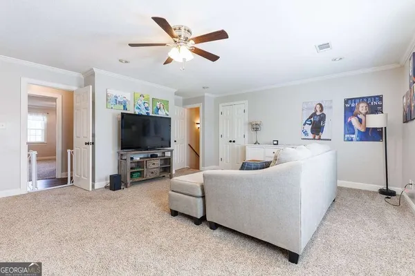 a bathroom with a shower and a toilet