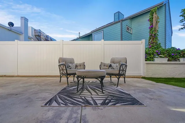 a front view of a house with a yard and a garage