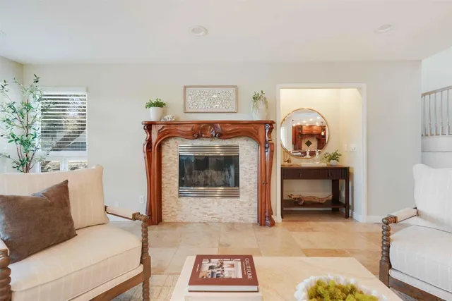 a dining room with table and chairs