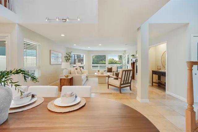 a sink with granite countertop wooden cabinets and a sink