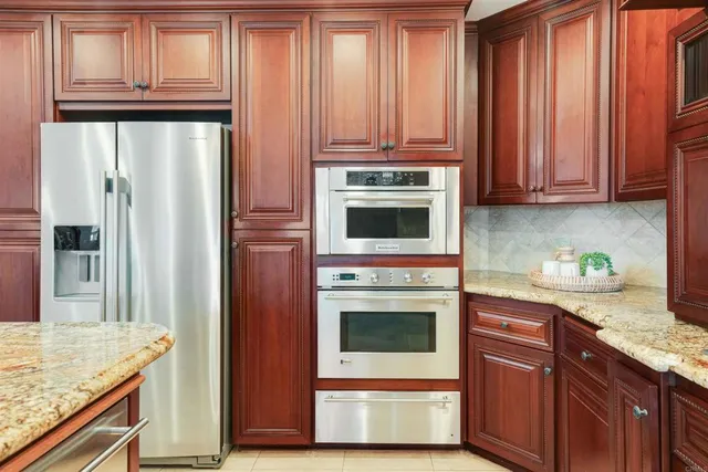 a view of swimming pool with furniture