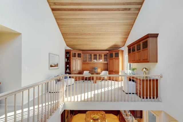 a view of kitchen with furniture and windows
