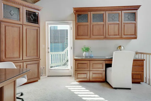 a view of a patio with couches chairs and potted plants