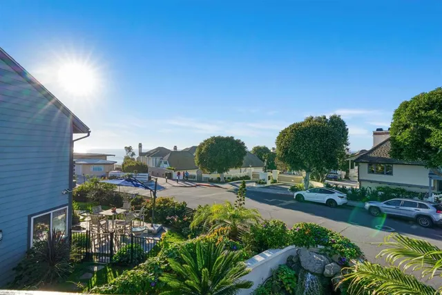 a view of empty room with white walls