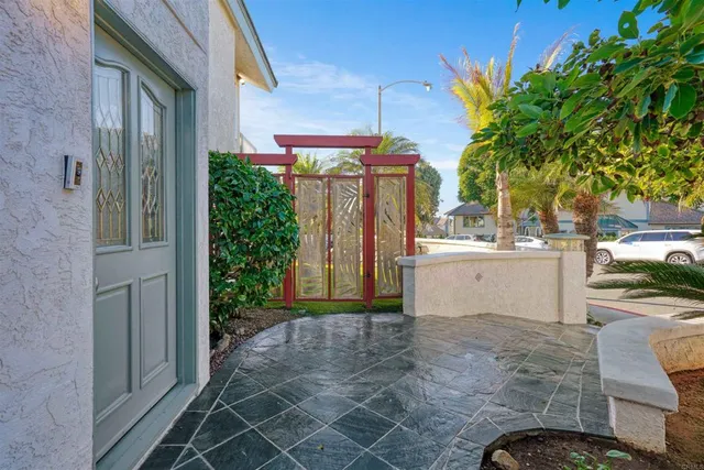 a view of swimming pool with a patio and a garden