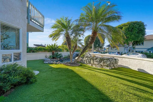 a view of yard with swimming pool