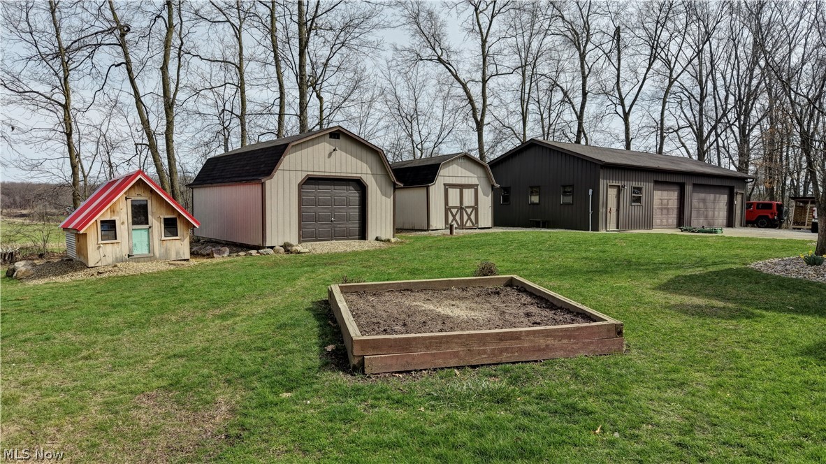 8045 McFadden Road Shreve, OH 44676 - Photo 13 of 45 View of shed featuring a garden
